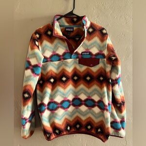 Patagonia synchilla. Super cute. Size Med. Button Quarter snaps.